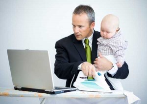 man with baby and iron